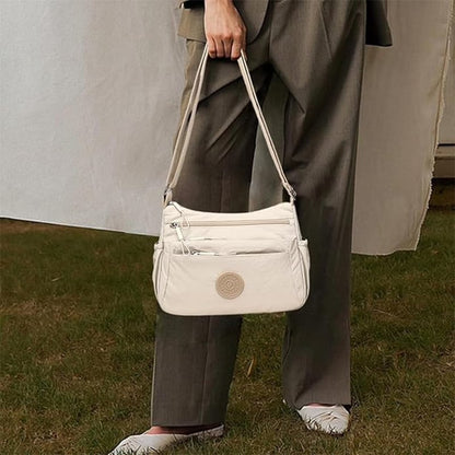 PocketPro – Multi-Compartment Crossbody Bag